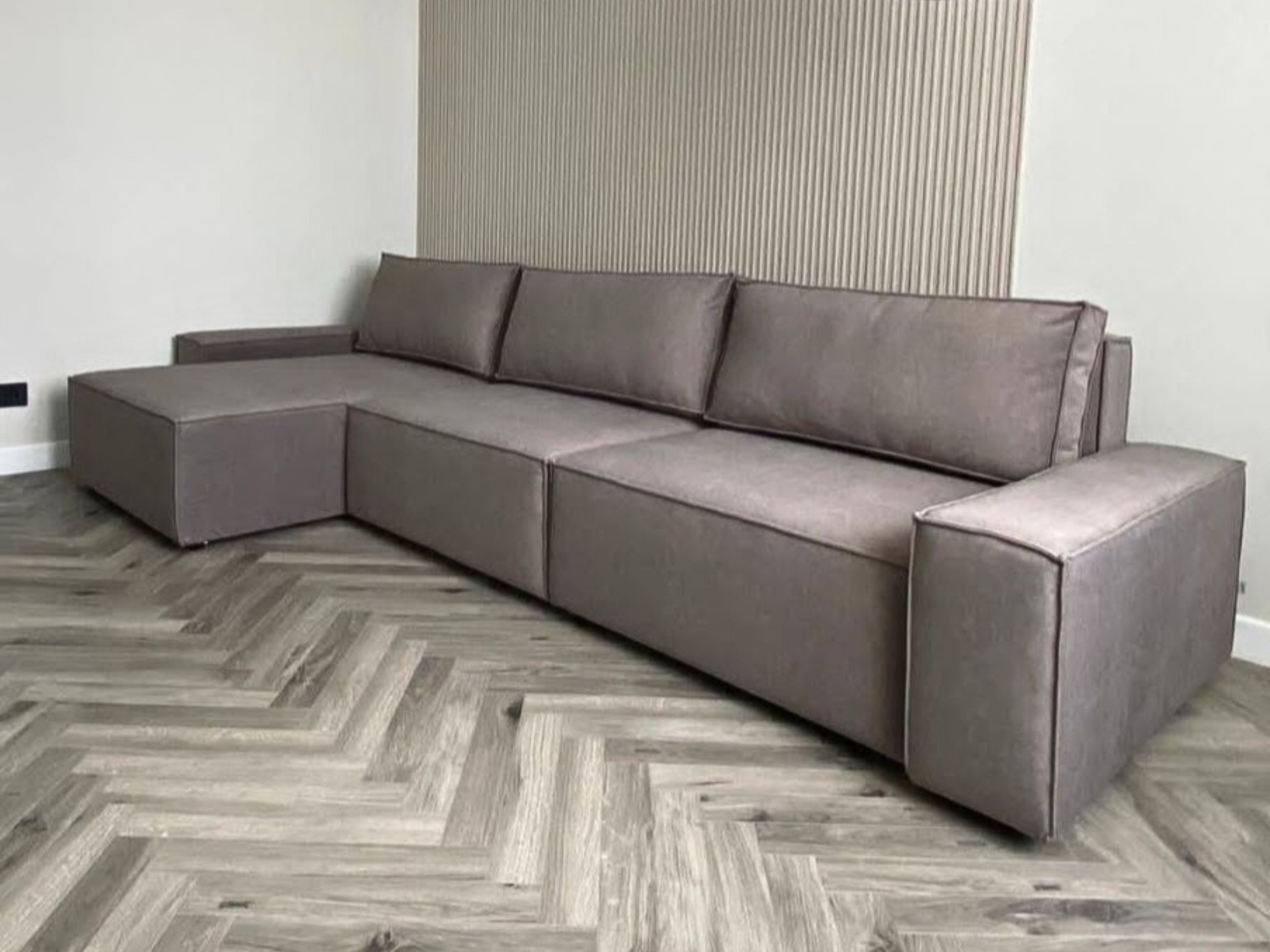 Duży narożnik w stylu industrialnym z funkcją spania